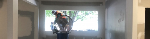 Photo of a construction worker framing a window at Richland Library Lower Richland.